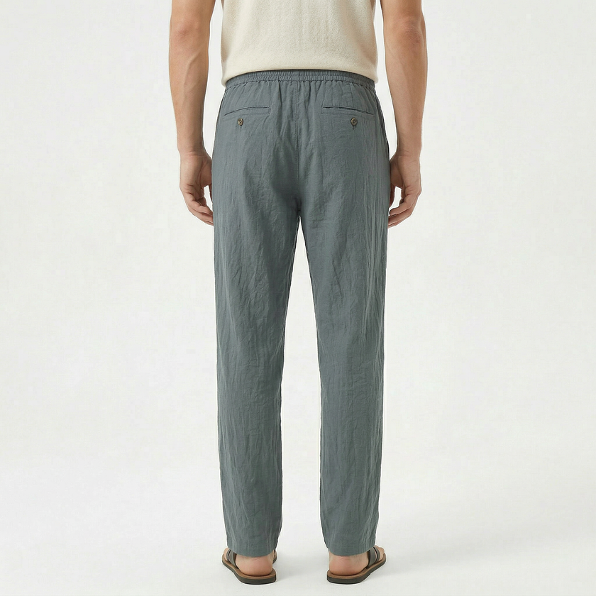Men's linen drawstring trousers by FJØRNA, light and breathable fabric with relaxed fit and adjustable waistband.