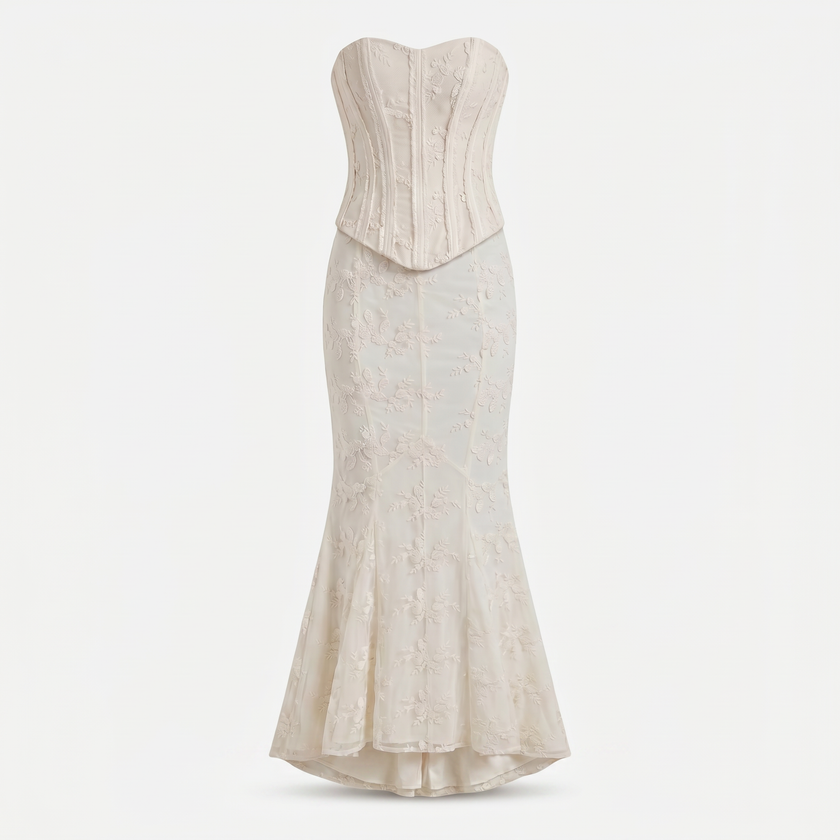 Women's strapless lace corset maxi dress by FJØRNA featuring intricate lace details and a flowing silhouette.