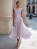 FJØRNA sleeveless pleated midi dress with draped neckline, flowing fabric, and elegant design perfect for stylish occasions.