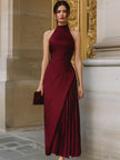 FJØRNA burgundy halter-neck asymmetric pleated midi dress, featuring a flowy design and elegant midi length.