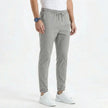 FJØRNA men's stretchable comfort trousers, casual men's pants with flexible fabric and classic fit, shown in dark blue.