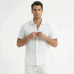 Men's FJØRNA cotton-linen short sleeve shirt displayed on a hanger, showcasing a casual, lightweight men's shirt for warm weather.