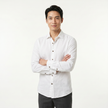 Men's FJØRNA long sleeve cotton button-down shirt in classic style, shown in a natural pose with collar and button details.