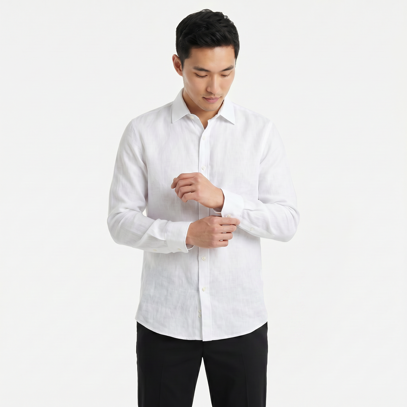 Men's FJØRNA long sleeve linen button-down shirt in a light-colored fabric with a classic collar and button cuffs.