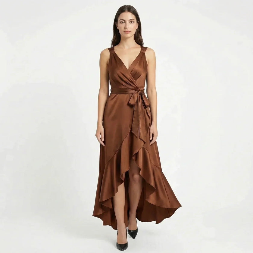 FJØRNA women's elegant sleeveless wrap midi dress displayed on a hanger, showcasing its stylish design and fabric details.