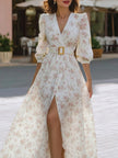 FJØRNA romantic floral chiffon maxi dress with belted waist, flowing fabric, and elegant floral pattern for special occasions.
