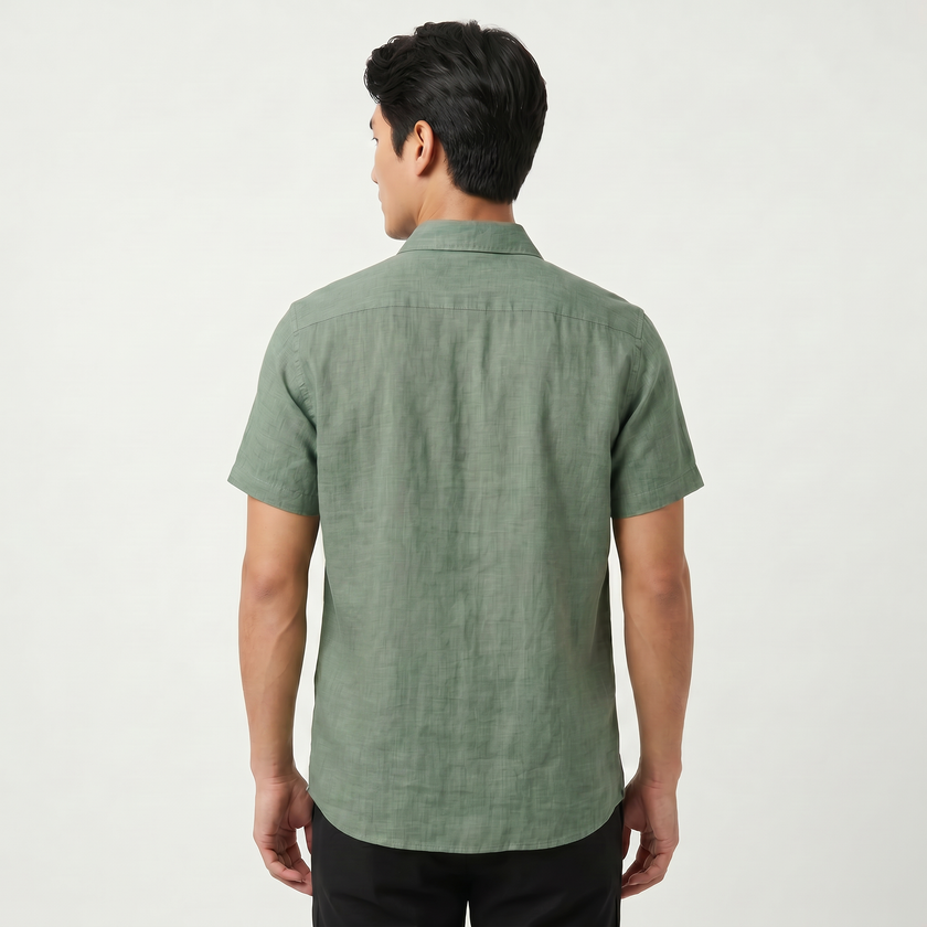 Men's green embroidered short sleeve shirt with Aztec print from FJØRNA, featuring button-up design and summer-ready style.