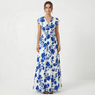 Women's V-neck floral print summer maxi dress by FJØRNA featuring a flowing design and vibrant floral pattern.