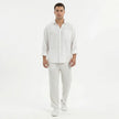 Men's wide-leg summer pants by FJØRNA, shown in light fabric with relaxed fit, perfect for warm weather casual wear.