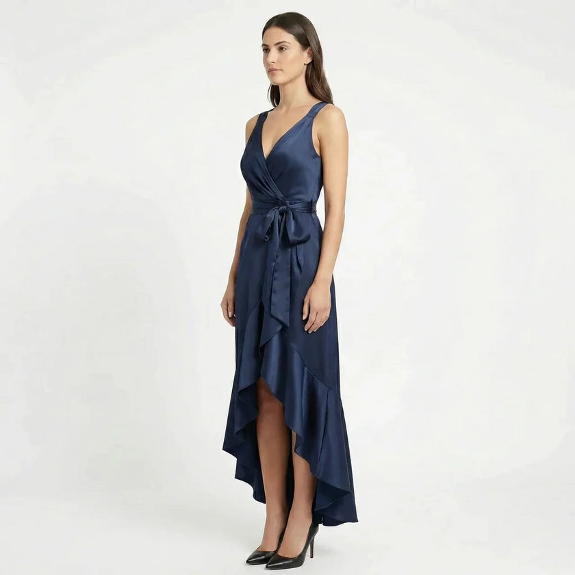 Women's elegant sleeveless wrap midi dress by FJØRNA featuring a stylish, flowing design and a flattering fit for sophisticated occasions.