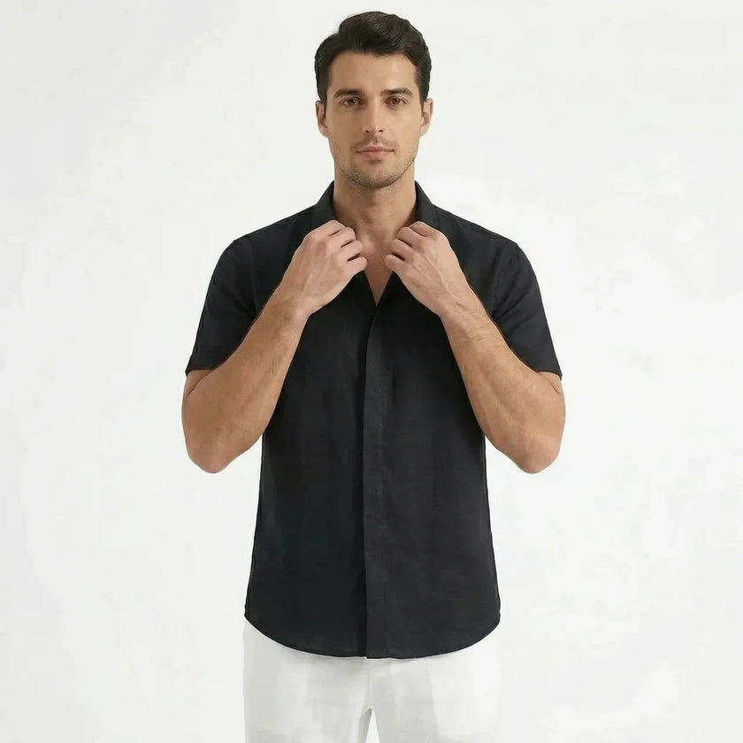 Men's cotton-linen short sleeve shirt by FJØRNA, lightweight and breathable with a casual button-up style, shown in the image.