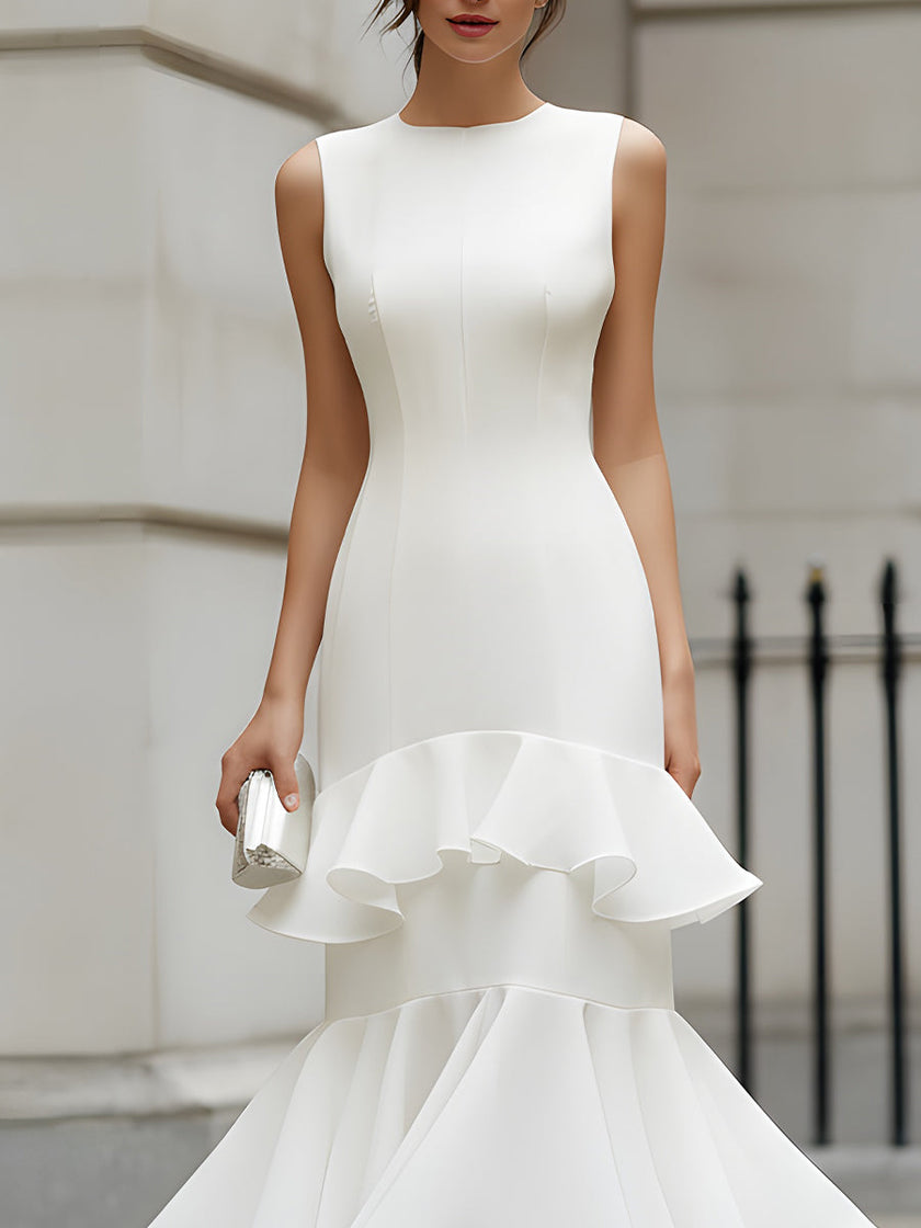 FJØRNA sleeveless tiered ruffle midi dress with layered fabric and flowing silhouette, perfect for summer or special occasions.