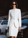 FJØRNA elegant tailored skirt suit with sculpted peplum jacket, mini dress style, perfect for sophisticated women’s fashion.