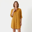 FJØRNA women's oversized linen shirt dress with button-down front, relaxed fit, and long sleeves, perfect for casual wear.