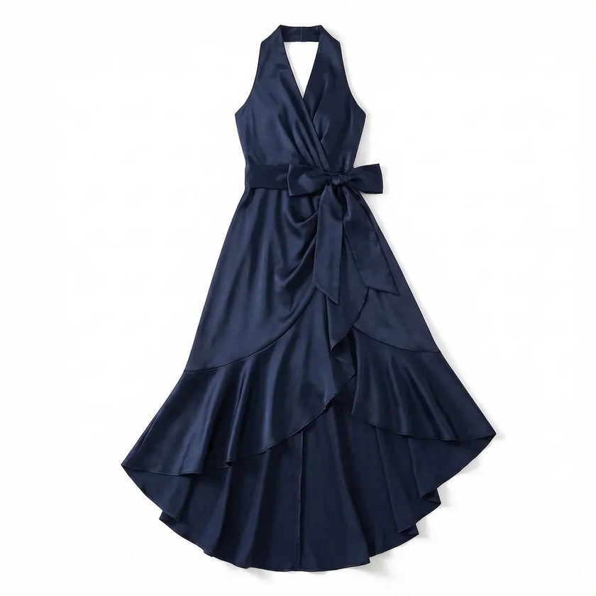 Women's elegant sleeveless wrap midi dress by FJØRNA, featuring a flattering fit and stylish design, showcased in this image.