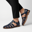Men's leather closed toe fisherman sandals by FJØRNA, featuring sturdy design and adjustable straps for comfortable wear.