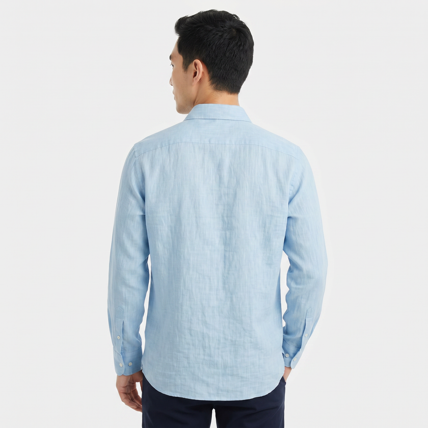 Men's FJØRNA long sleeve linen button-down shirt in a light, breathable fabric, displayed on a hanger with a casual fit.