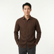 Men's FJØRNA long sleeve cotton button-down shirt, tailored fit with collar and button closures, displayed on a hanger.
