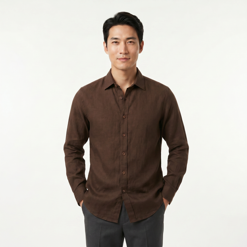 Men's FJØRNA long sleeve cotton button-down shirt, tailored fit with collar and button closures, displayed on a hanger.