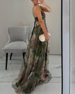 FJØRNA women's elegant floral maxi dress with V-neck, flowing fabric, perfect for formal or summer occasions.