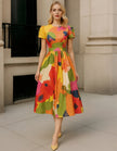 Red satin midi dress for women with A-line silhouette, pleated skirt, and puff sleeves by FJØRNA.