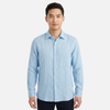 Men's FJØRNA long sleeve linen button-down shirt with a classic collar and lightweight fabric, shown in a relaxed fit.