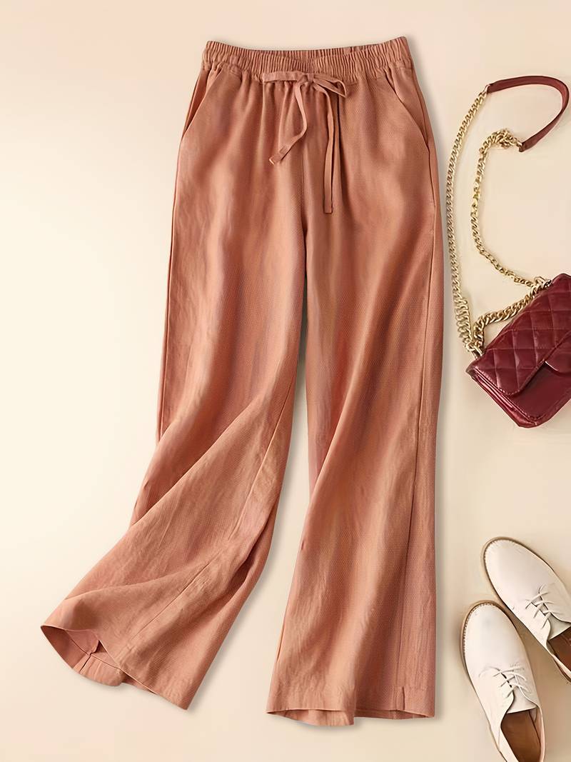 FJØRNA lightweight summer women's trousers with relaxed fit, drawstring waist and side pockets, suitable for casual wear