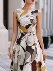 FJØRNA abstract floral sleeveless fit and flare midi dress with vibrant floral patterns and a flattering silhouette.