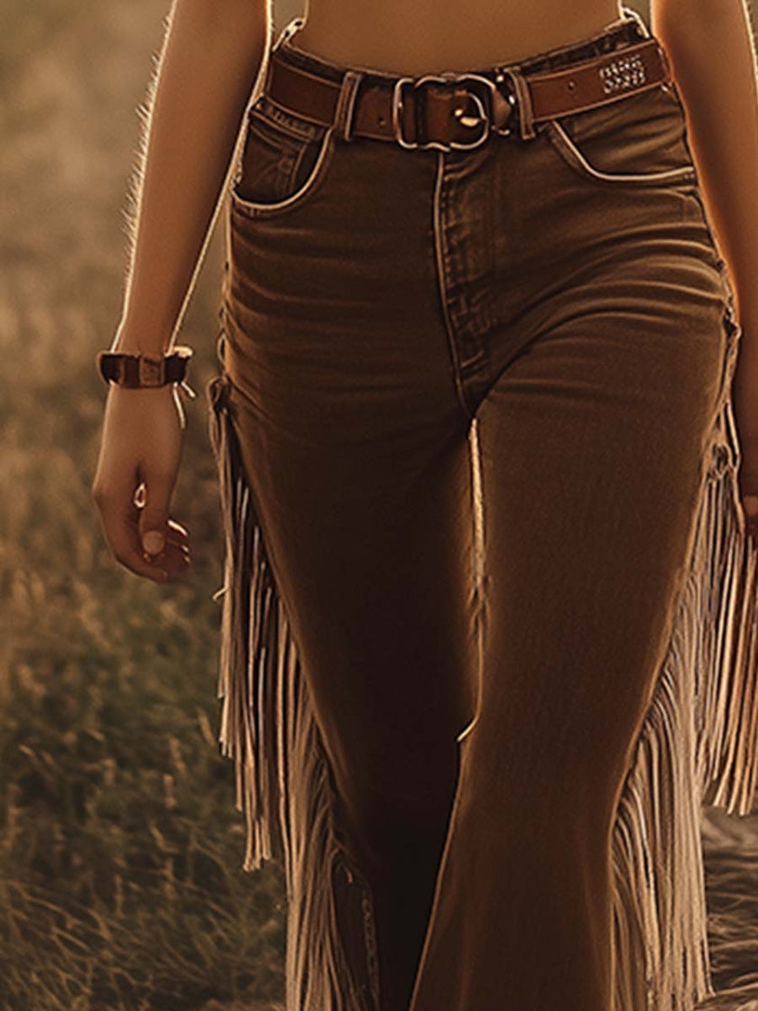 FJØRNA brown Western fringe flared jeans for women, stylish pants with fringe details and a flared silhouette.