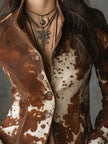 Brown cow print suede women's jacket with stand collar by FJØRNA, featuring stylish cow pattern and soft suede texture.