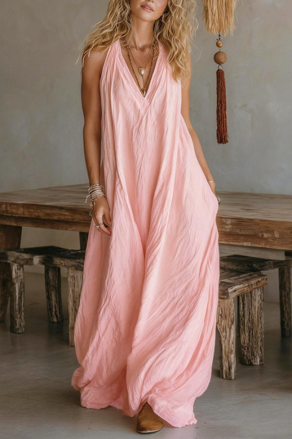 FJØRNA linen blend solid color sleeveless maxi dress with V-neck, pockets, and a loose casual fit.