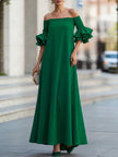 White FJØRNA maxi dress with half sleeves, loose fit, solid color, off-the-shoulder style, perfect for casual or summer wear.
