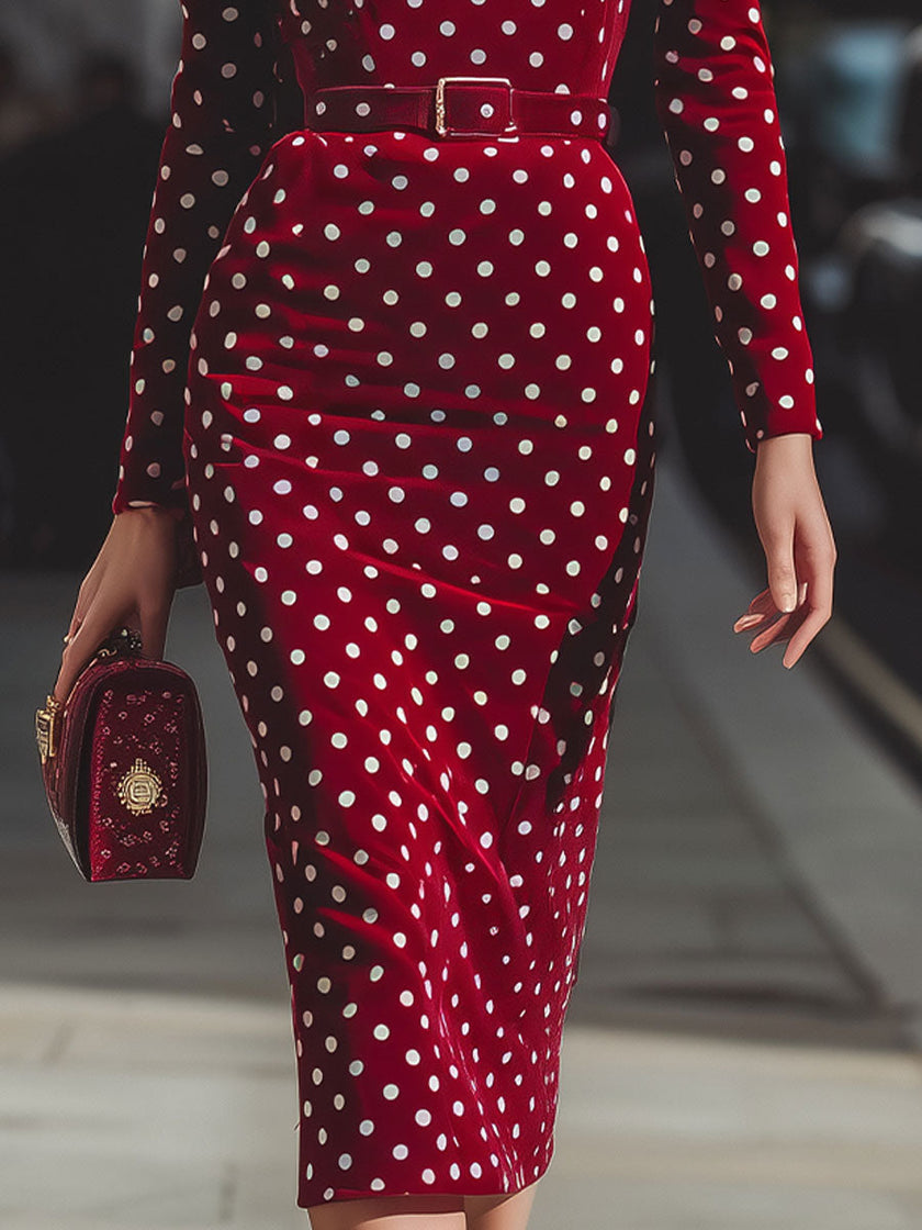 FJØRNA vintage-inspired red polka dot velvet midi dress for women, showcasing a classic style with a fitted waist and flowing skirt.