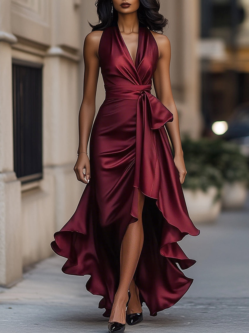 FJØRNA Midnight Elegance satin halter ruffle gown, full-length dress with flowing fabric and stylish ruffle details.