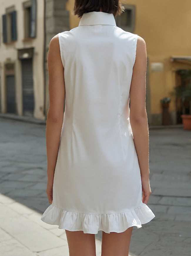 FJØRNA sleeveless button-front mini dress with ruffle-hem in a chic shirt dress style, perfect for casual or summer wear.
