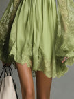 FJØRNA elegant off-shoulder pleated mini dress for women, stylish and fitted, perfect for casual or semi-formal occasions.