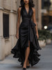 FJØRNA Midnight Elegance satin halter ruffle gown displayed on a dress form, featuring a flowing black satin fabric with ruffle details