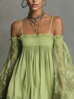 FJØRNA elegant mini dress for women featuring off-shoulder design and pleated fabric, perfect for stylish occasions.