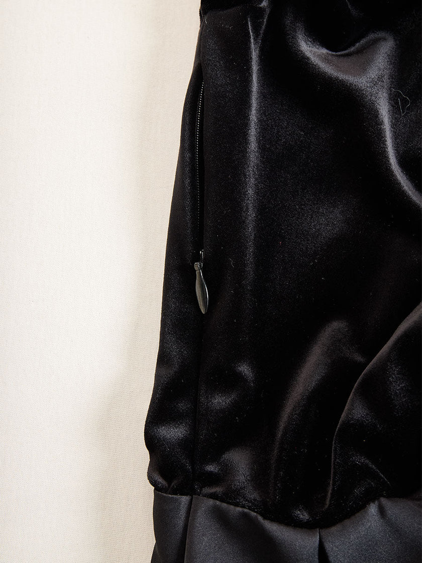 Elegant black velvet and satin midi dress by FJØRNA, featuring a stylish, fitted design perfect for formal occasions.
