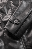 FJØRNA black vintage faux leather jacket with stand collar, stylish outerwear with classic design and textured material.