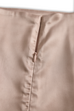 FJØRNA champagne satin mini dress with square neckline and long sleeves, stylish and elegant for special occasions.
