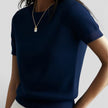 Women's FJØRNA knit top in wool blend, comfortable classic fit, short-sleeve shirt with a cozy, stylish look.