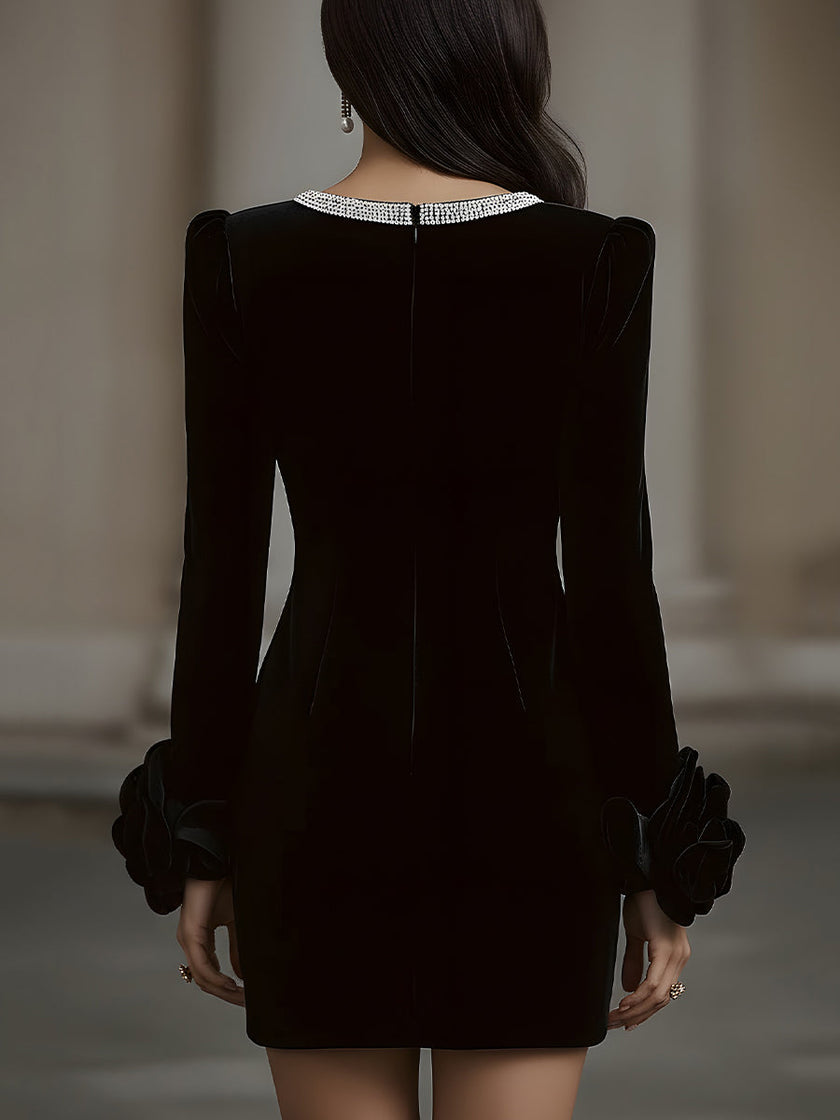 FJØRNA elegant velvet mini dress featuring an embellished neckline and floral cuff details, perfect for stylish women.