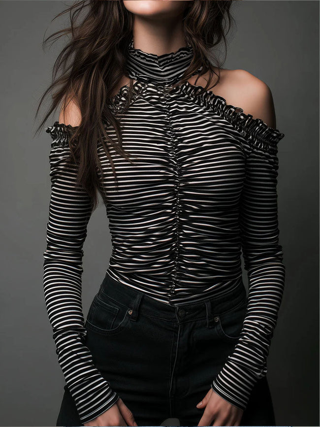 Black striped FJØRNA high neck cold-shoulder ruched T-shirt with long sleeves and fitted design, shown on a mannequin.