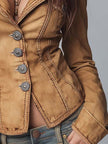 FJØRNA camel washed slim-fit denim jacket for women, showing front view with classic collar and button closure.