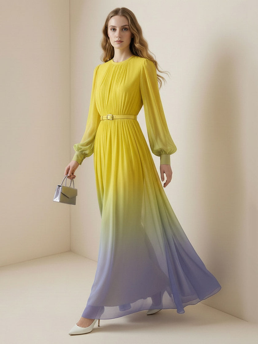 FJØRNA high waisted maxi dress with long sleeves, belt, contrast color gradient, pleated design, split joint, and round neck.