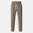 Men's wide leg joggers by FJØRNA with drawstring waist, relaxed fit, and casual style, shown in dark fabric.