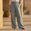 FJØRNA women's wide-leg high-waist elastic trousers with relaxed fit and flowing fabric, stylish and comfortable for casual wear.