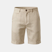 Men's linen blend tailored shorts by FJØRNA, relaxed fit with a casual style, shown in natural beige color.