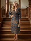 FJØRNA women's summer midi dress with long sleeves, wrap design, in soft fabric, ideal for warm weather and casual outings.